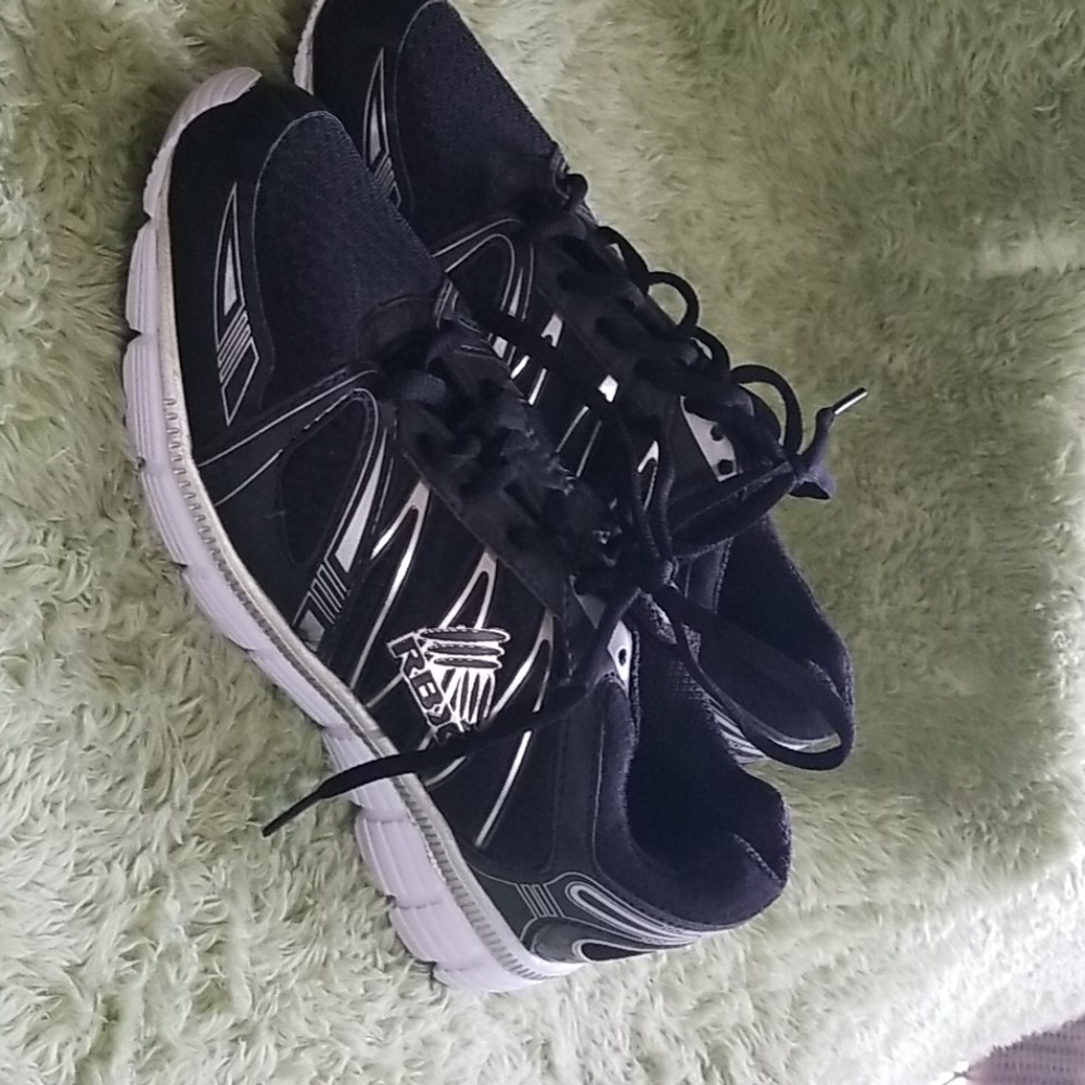 Black Reebok sneakers
